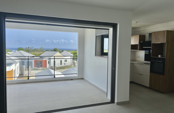 Appartement T2 neuf non meublé avec belle vue mer dans une petite résidence de standing avec piscine.