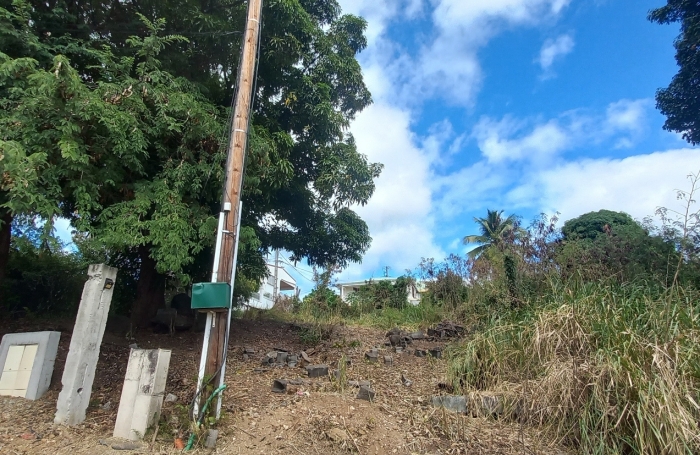 Ne passez pas à côté de ce Beau terrain de 1000 m2 avec vue sur la mer à vendre à VIEUX HABITANTS
