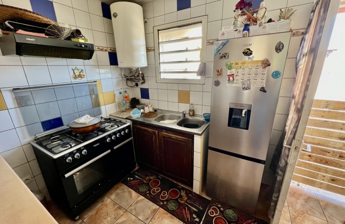 SAINT LOUIS 97450 - ENSEMBLE IMMOBILIER - REVENU LOCATIF - PROCHE COMMODITÉS - QUARTIER RÉSIDENTIEL