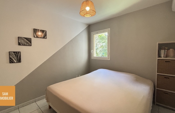 Appartement T3 en rez-de-jardin avec jardin privatif de 58m2 et 2 places de parkings